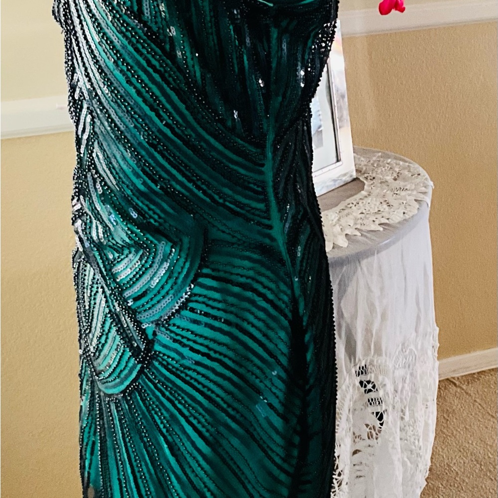 Black beaded dress over green with tassels on bottom - Picture 2 of 8